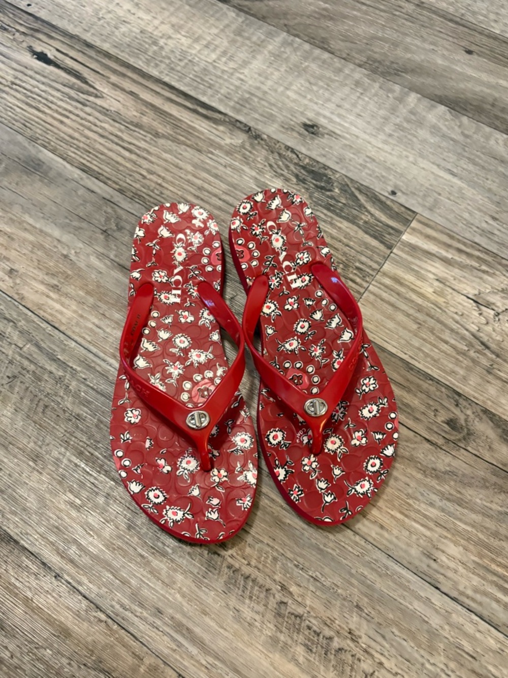 Coach flip flops